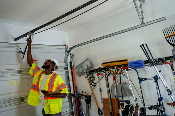 Professional Garage Door Panel Replacement technician working in Leonia, NJ